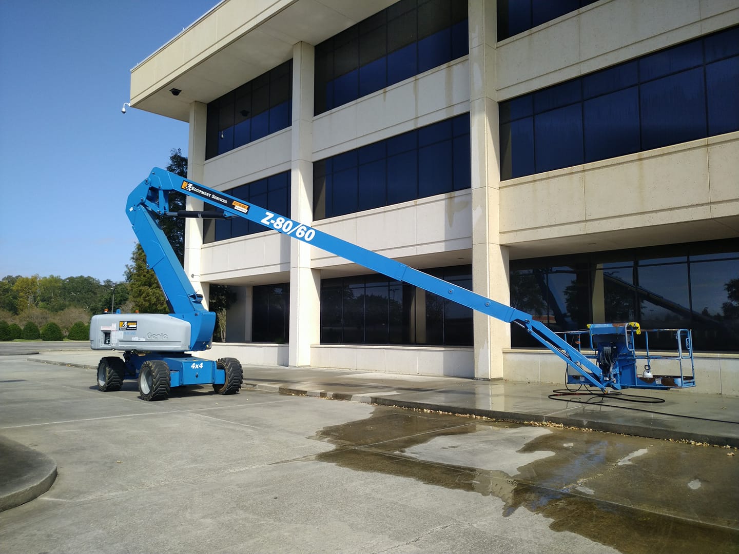 A crane in front of a building