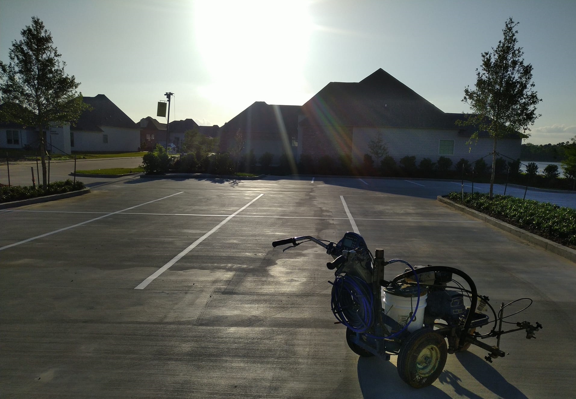 sunlight over a freshly painted parking lot